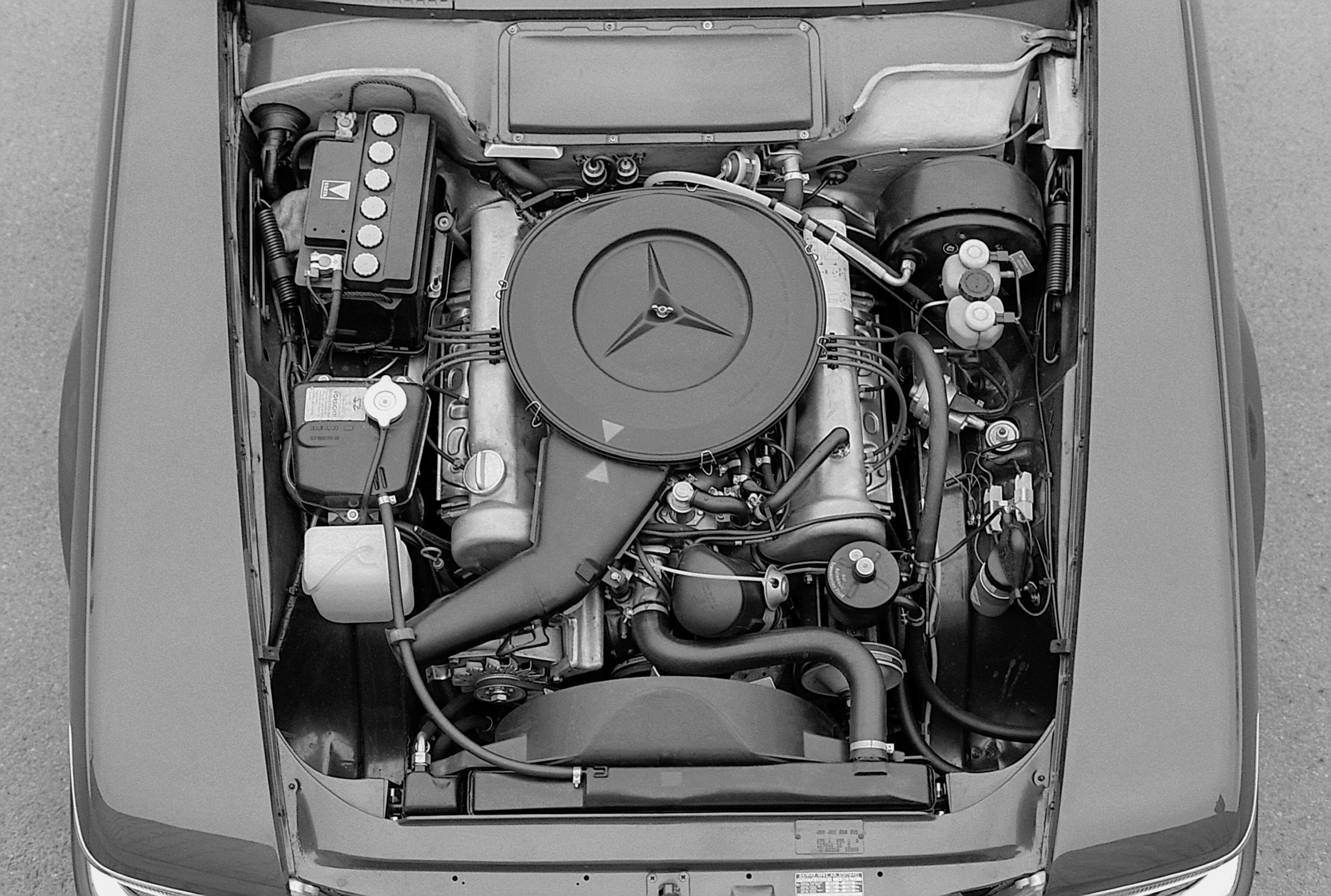 The signature V8 shown here in an early Mercedes R107 350 SL