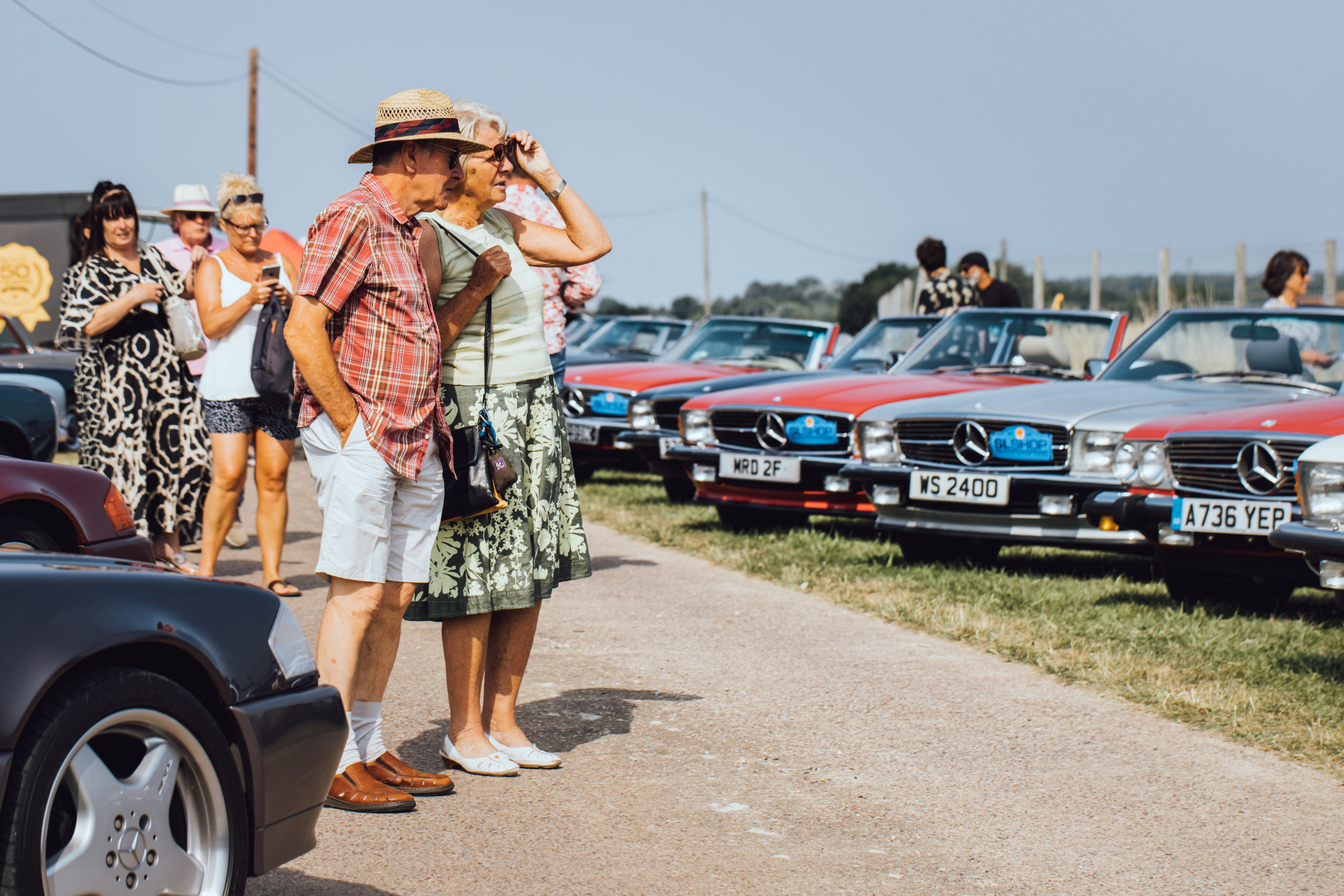 Owners admiring other R107 SLs